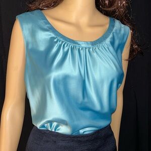 Sleek Blue Sleeveless Blouse